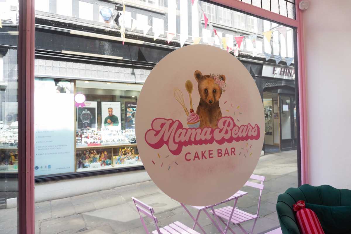 Window sign looking out into The Walk